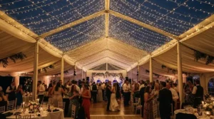 Elegant white fairy lights with remote styling a British wedding marquee ceiling