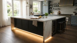 Bright coloured kickboard RGB plinth lights kitchen fitted along a contemporary white island
